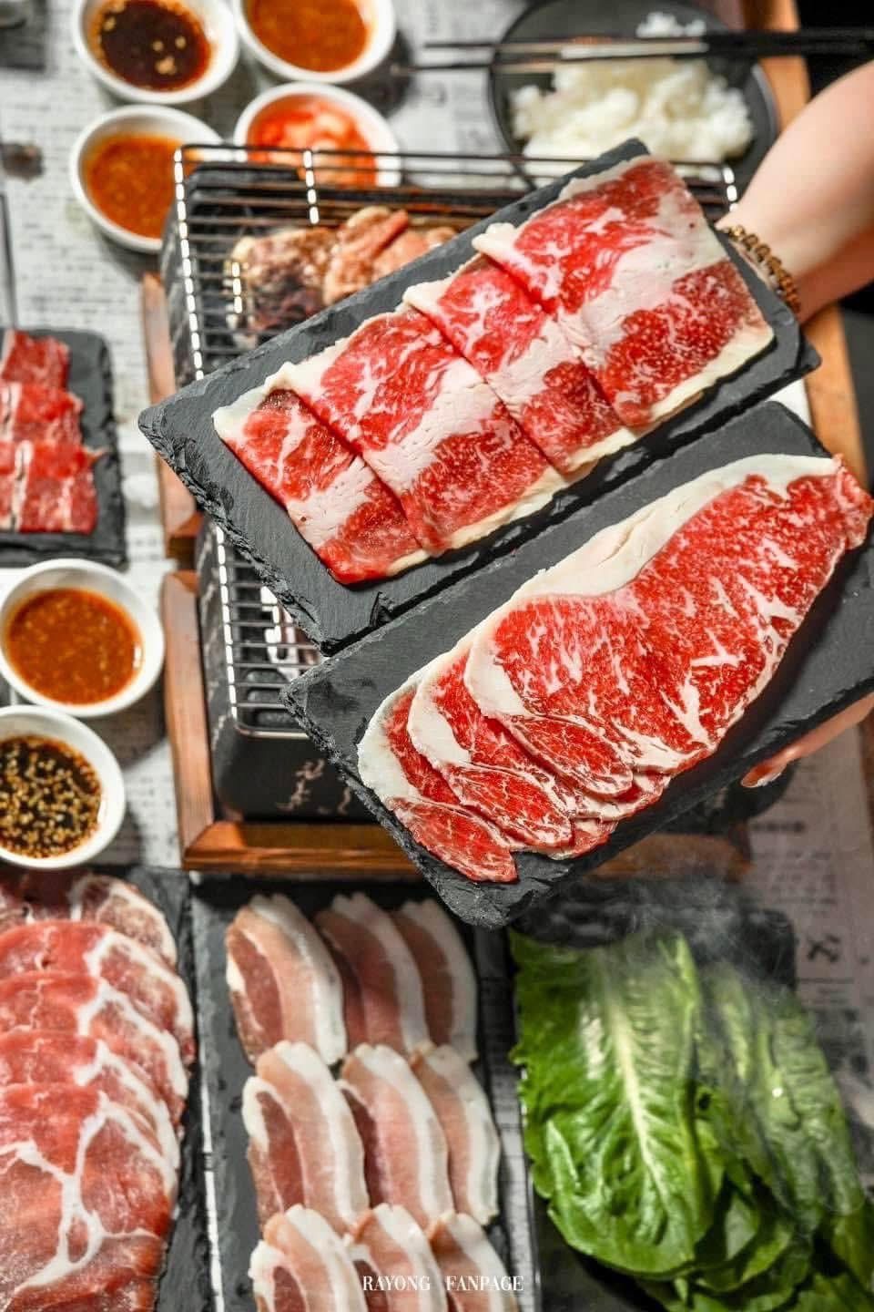 Premium wagyu cuts on slate platter at the grill