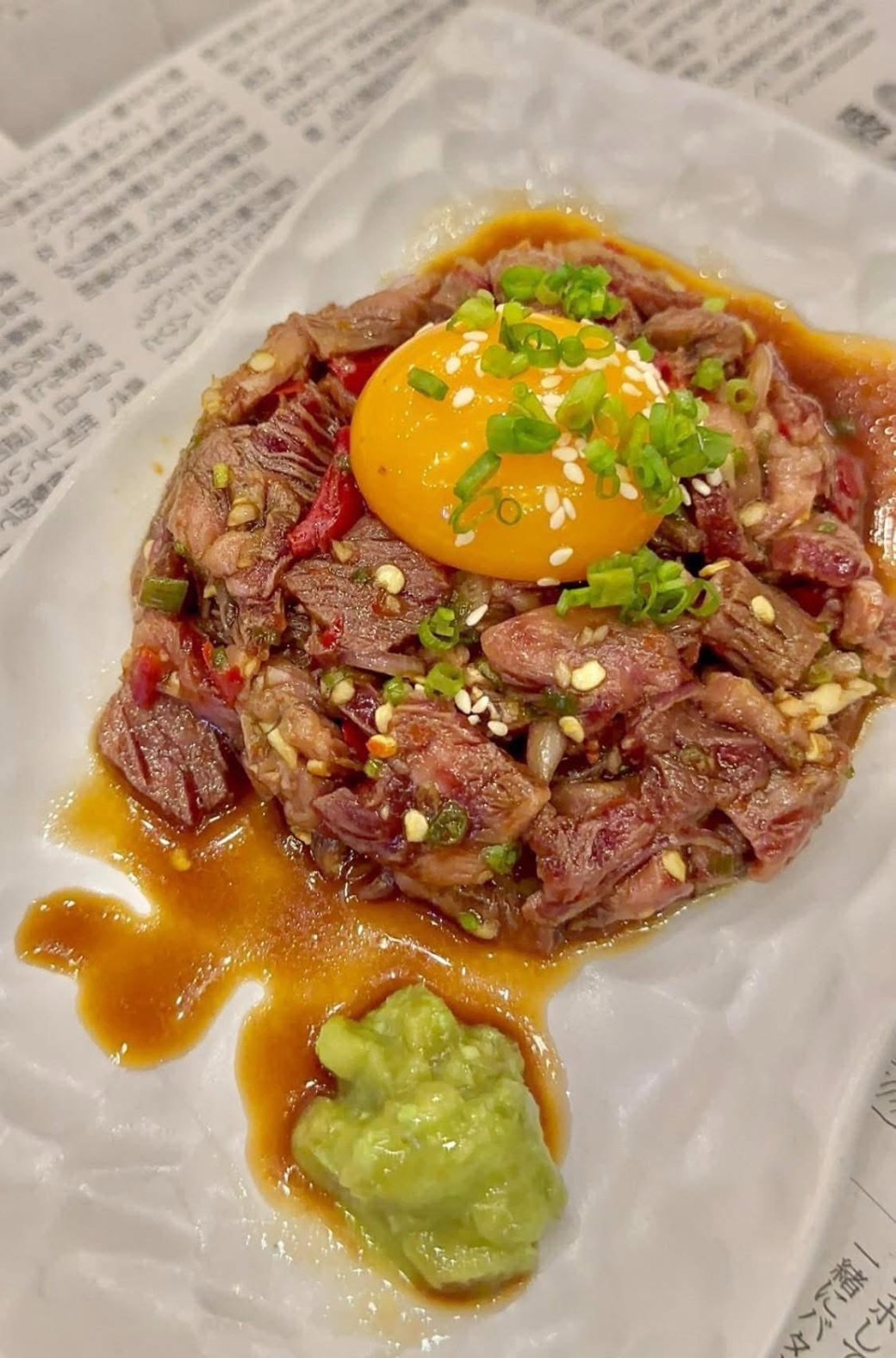 Wagyu yukke tartare with egg yolk and wasabi